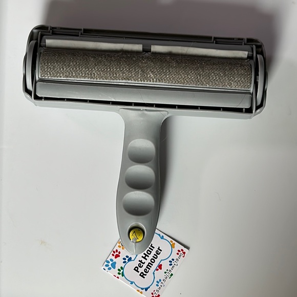 Other - COPY - NWT pet hair remover roll the brush along any surface with pet hair and …